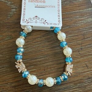 Elegant Blue and Pearl Bracelet All accessories in my closet are $8 or 3 for $20